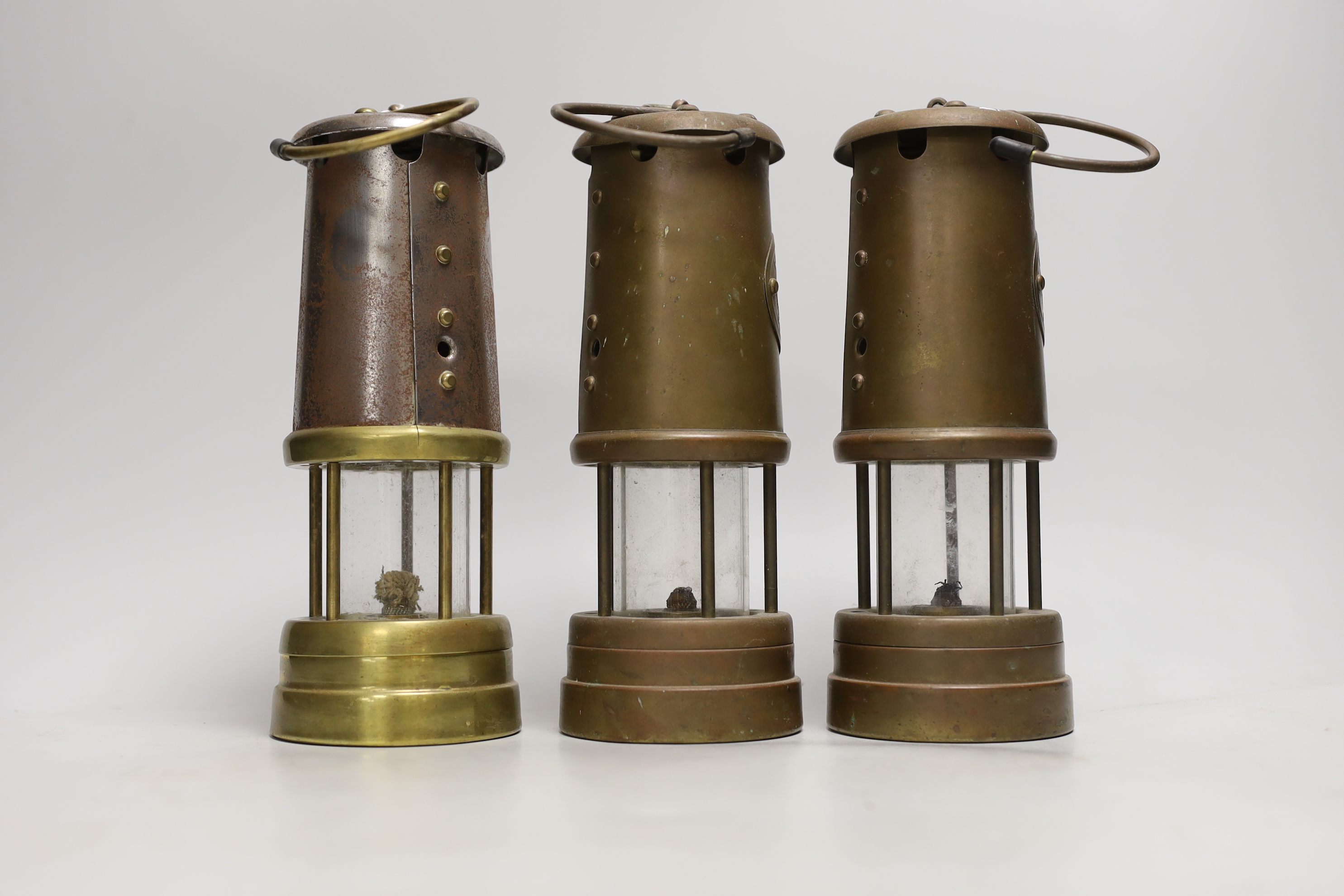 Three British Colliery Mining safety lamps